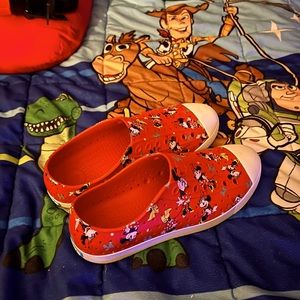 Women size 10 croc like shoes only lighter. Got them from Hollywood Studios..